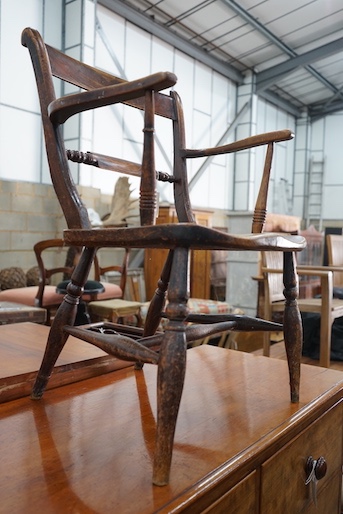 A Victorian elm and beech Windsor elbow chair, width 50cm, depth 43cm, height 84cm